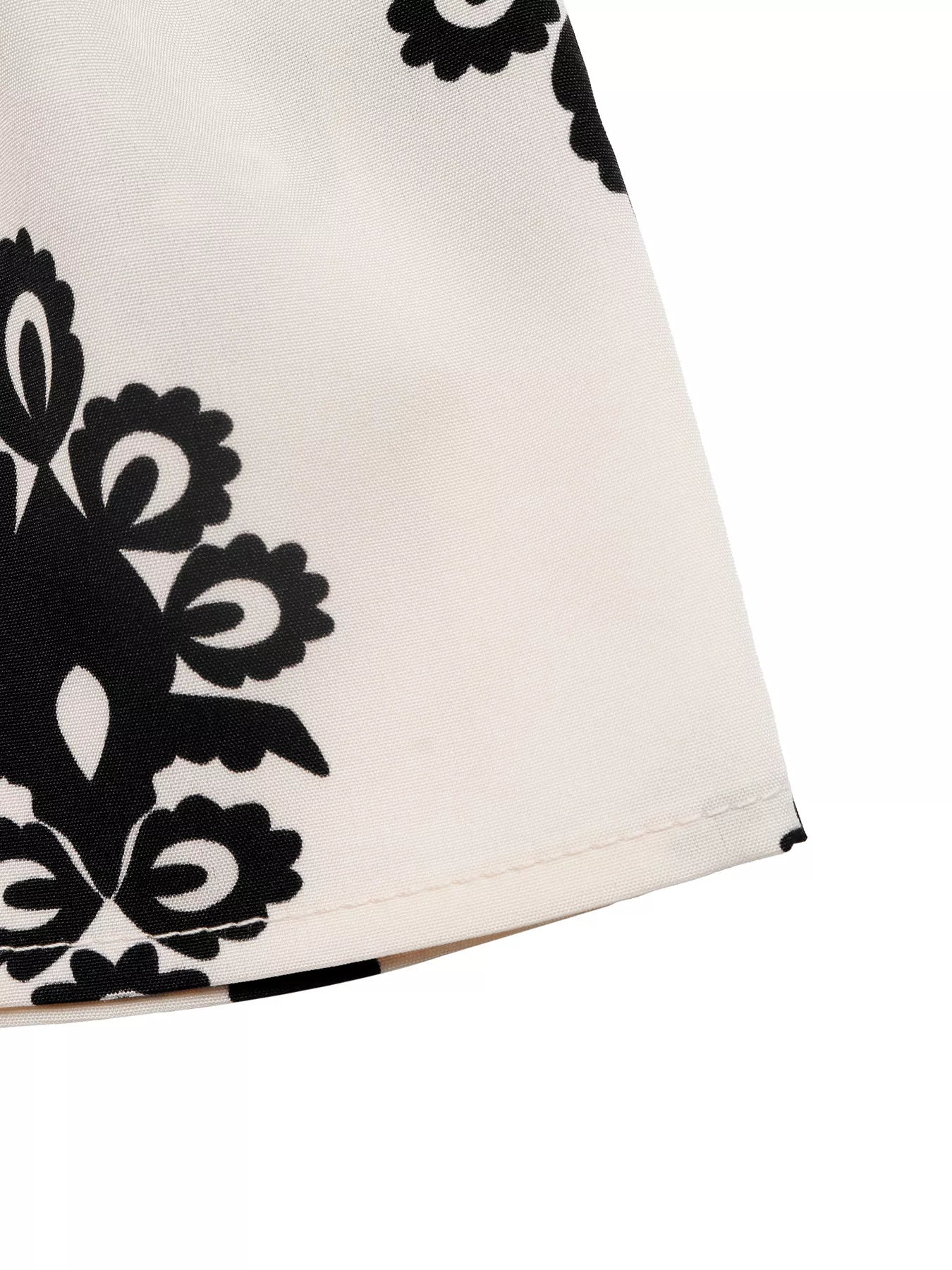 Koiboni smocked waist printed summer shorts with bohemian style, lightweight and breezy for warm-weather wear.
