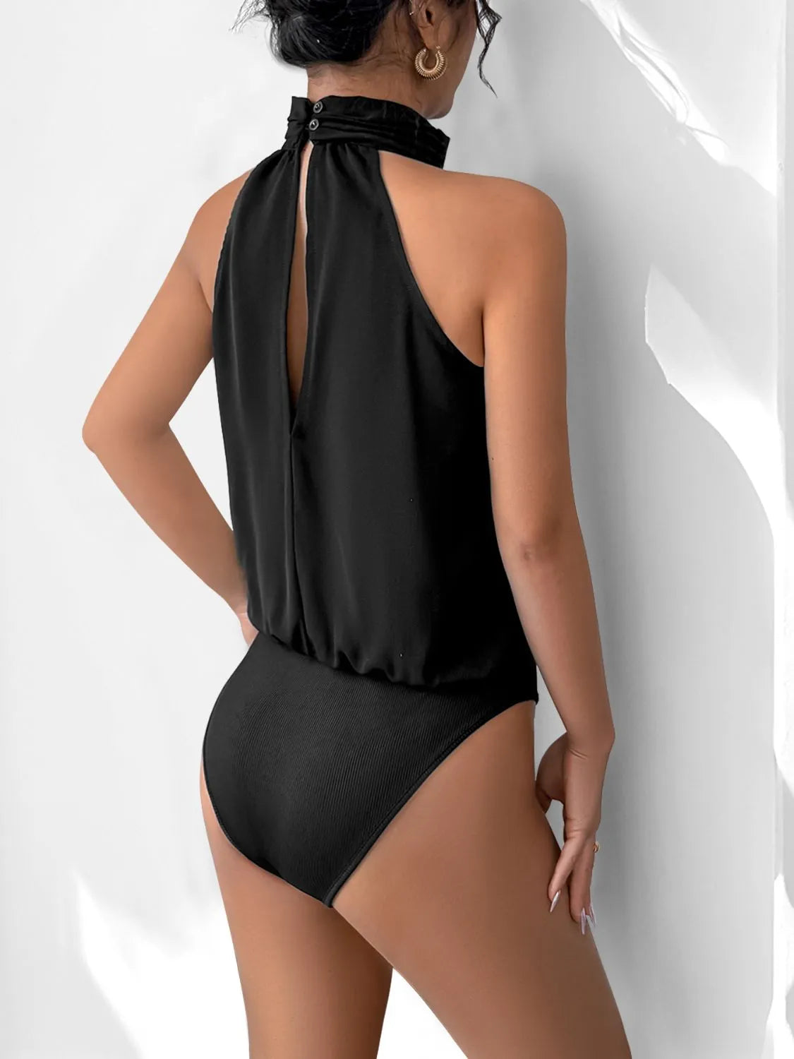 KOIBONI 3D flower Grecian neck bodysuit featuring elegant floral design, ideal as a statement top in a stylish, form-fitting cut.