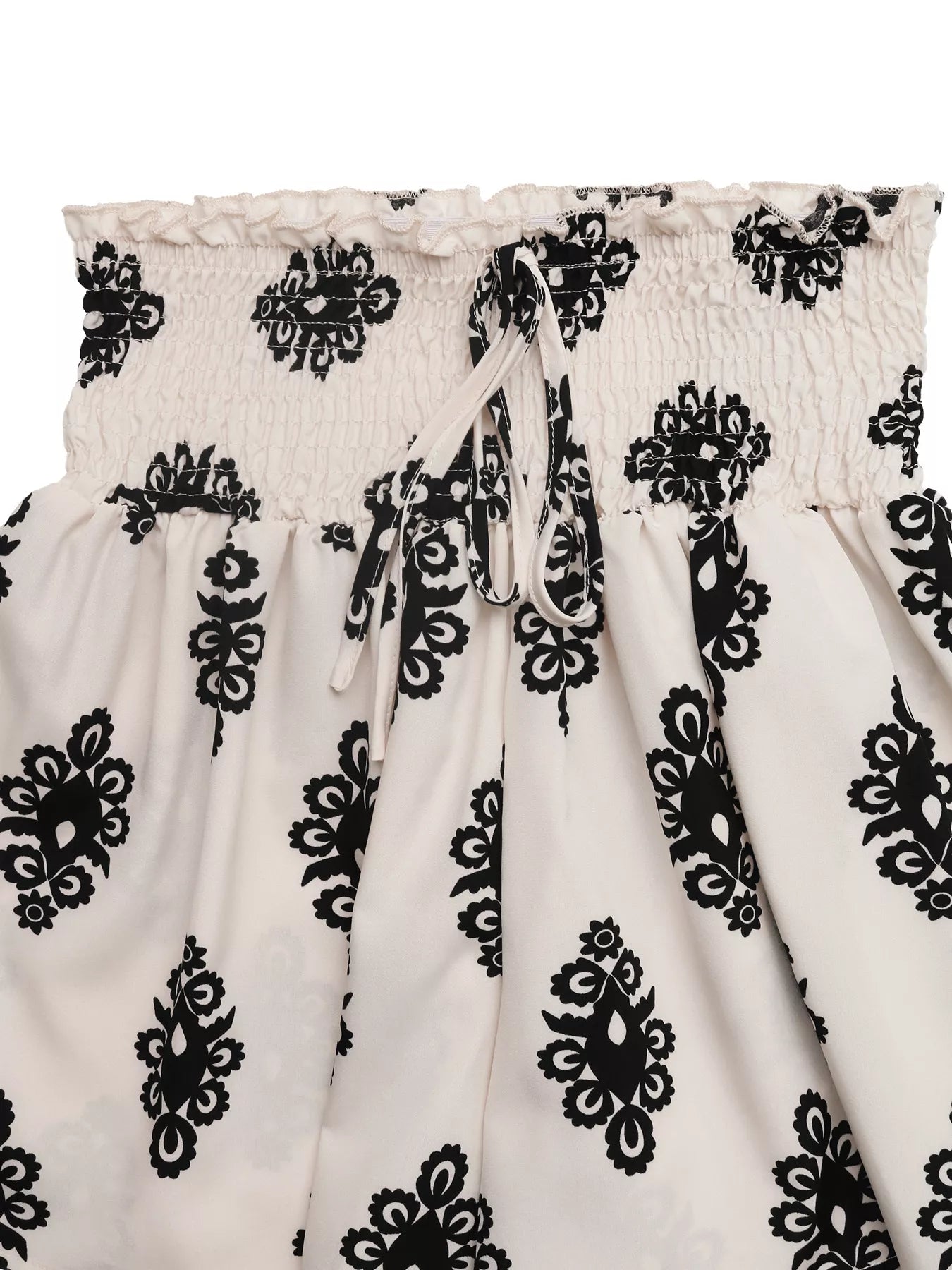 KOIBONI smocked waist printed summer shorts with a breezy bohemian design, perfect for casual warm-weather wear.