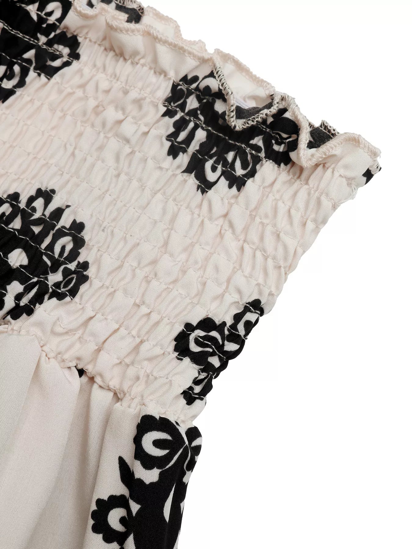KOIBONI smocked waist printed shorts featuring a bohemian summer design, perfect for casual warm-weather wear.