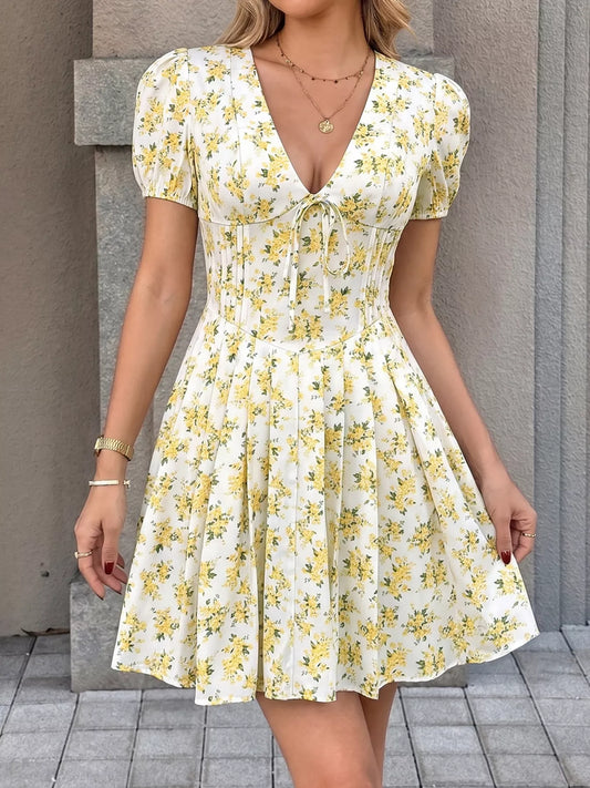 KOIBONI floral print V-neck puff sleeve mini dress with romantic ruched design, perfect for party or casual occasions.