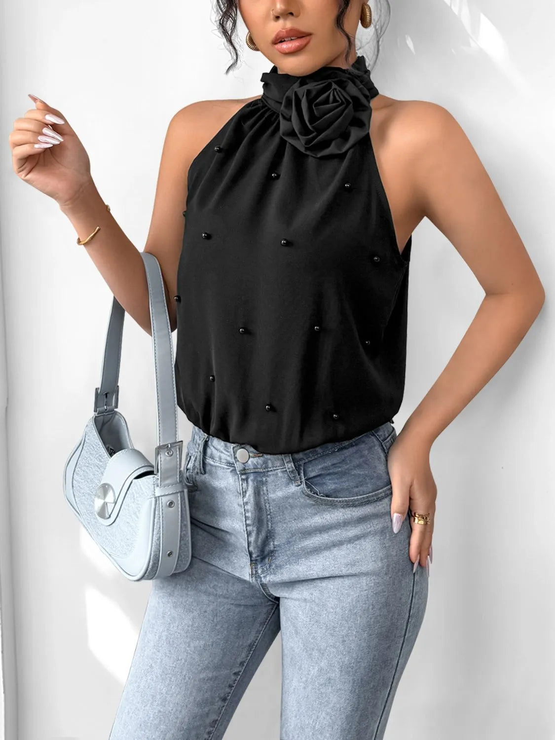 KOIBONI 3D flower Grecian neck bodysuit featuring elegant floral design and sculpted fit, perfect as a statement top.